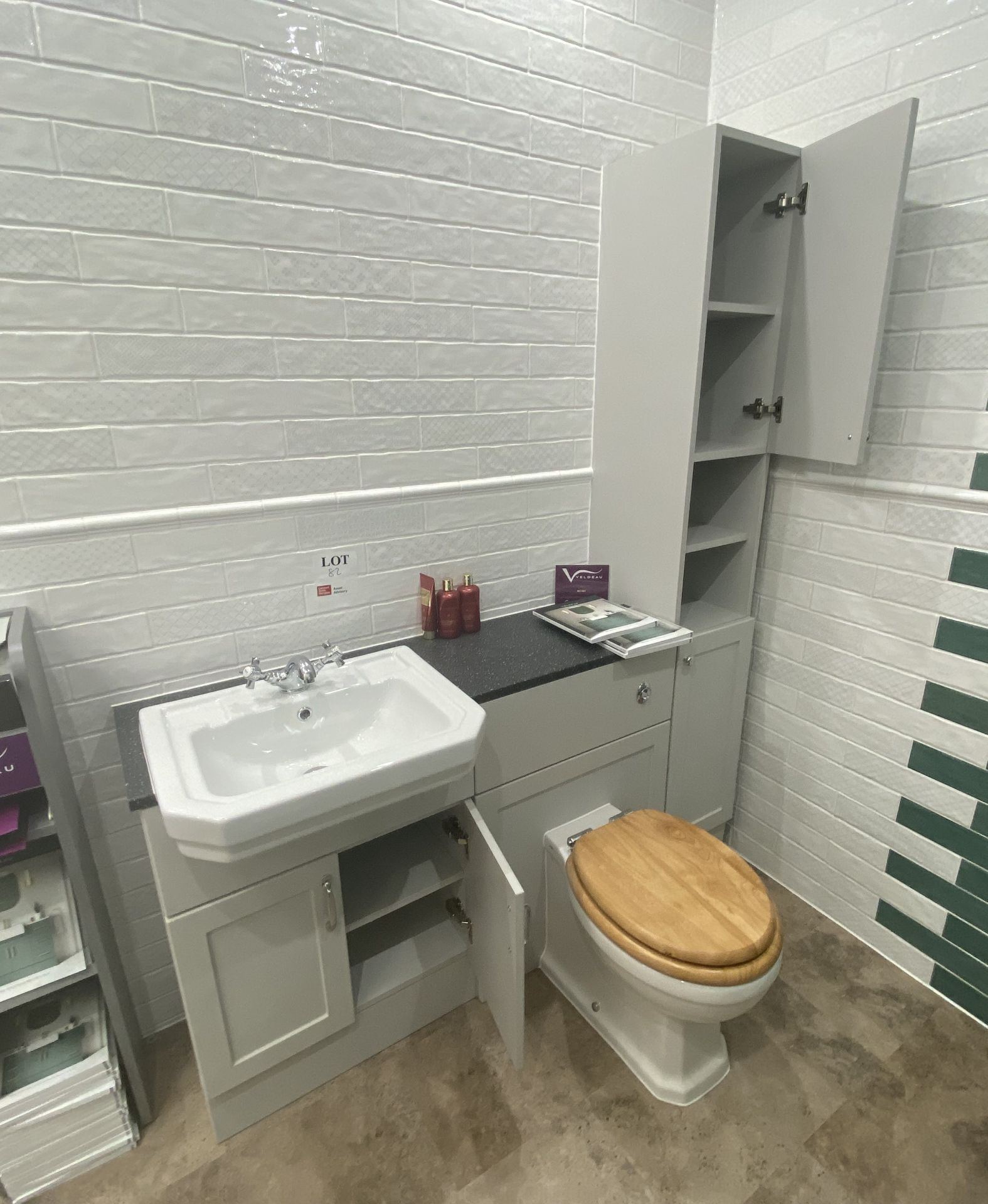 Display bathroom to include toilet, fitted 3 cupboard unit, sink basin with mixer tap