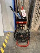 Packer strapping trolley