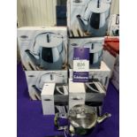 A Selection of Stainless Steel Teapots and Milk Jugs