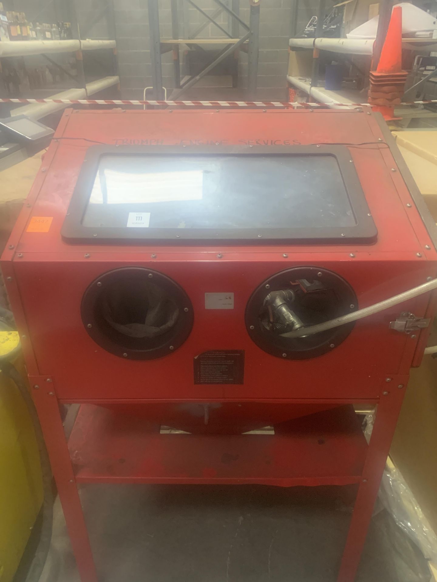 An SXC Shot/Sand Blasting Cabinet