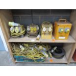 2x Shelves of Various 110V Items to include Cables, Splitter Boxes and a Transformer