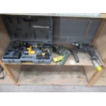 A Boxed Ryobi 18V Drill Set, together with An Hitchi 110V Drill and Bosch 110V Drill
