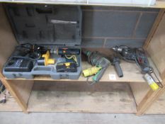 A Boxed Ryobi 18V Drill Set, together with An Hitchi 110V Drill and Bosch 110V Drill