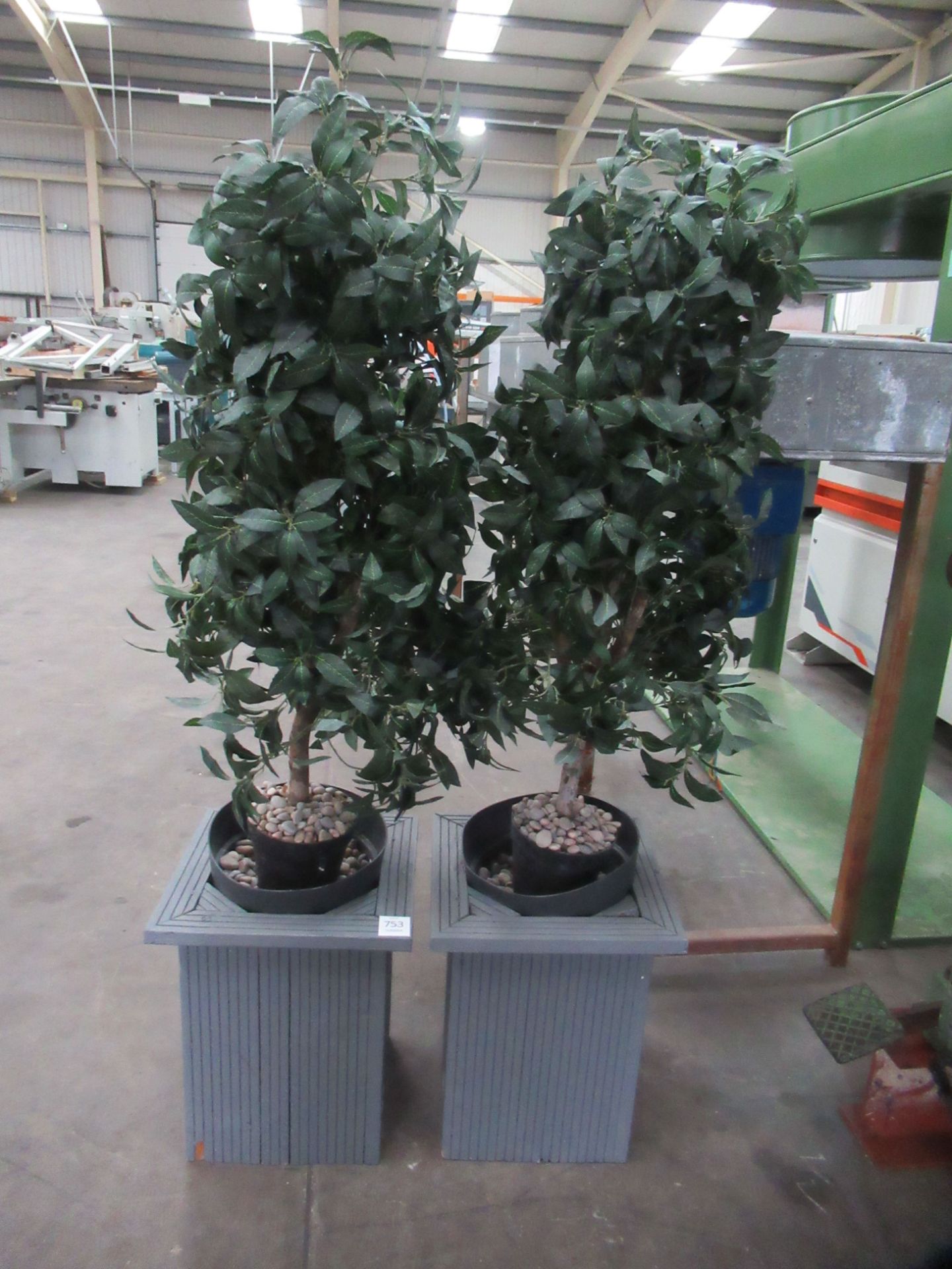 2x artificial plants in pots