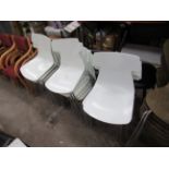 Qty of White Stacking Chairs