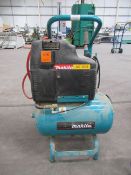 A Makita AC 1300 Frame Mounted Portable 110V Compressor