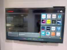 Toshiba 55” Wall Mounted TV with Remote – Buyer to Disconnect & Remove from Wall