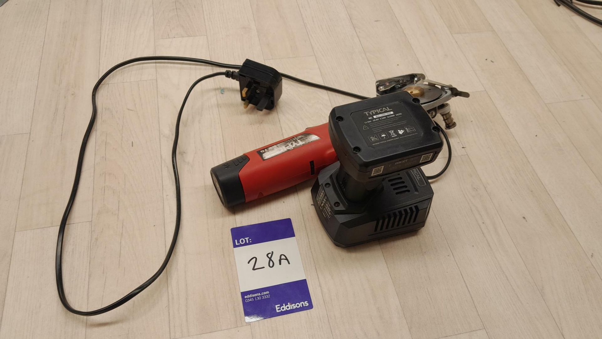 Typical TY-RK70 Battery Hand Cutter Serial Number RK70200911361 with charger and spare battery (