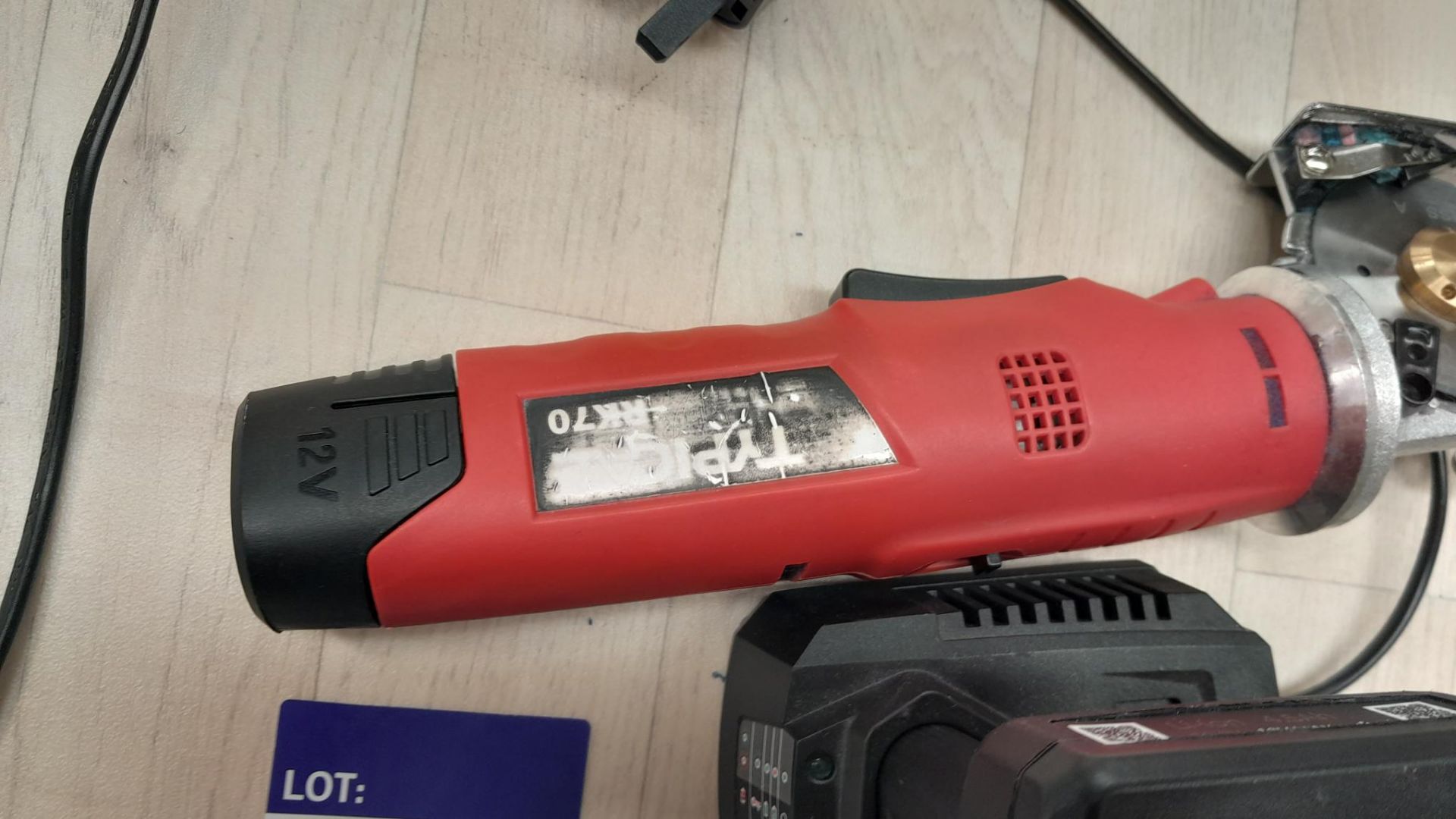 Typical TY-RK70 Battery Hand Cutter Serial Number RK70200911361 with charger and spare battery ( - Image 2 of 2