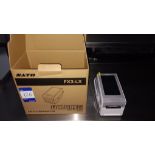 Sato FX3-LX Stand alone direct thermal label printer, serial number HG205610 (Jul 2023)