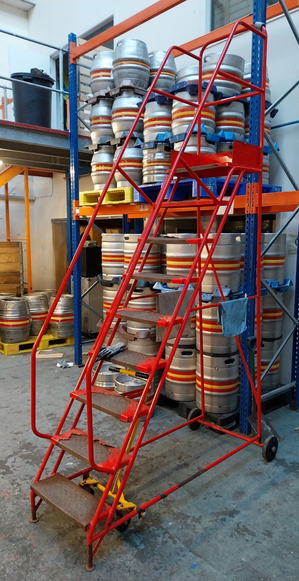 Red Metal mobile warehouse platform ladders