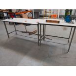 Two steel framed packing tables