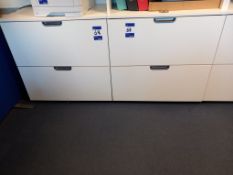 Two white laminate lateral filing units, one with