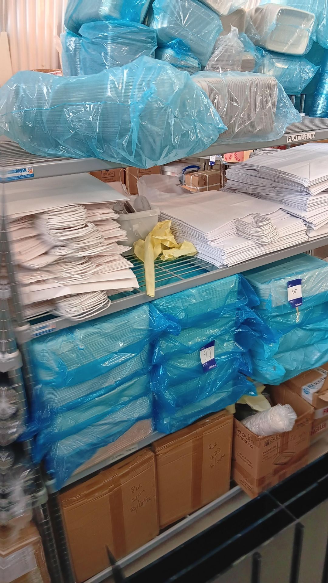 Contents of 2 racks of various packaging and consumables to include white paper bags, plastic and - Image 2 of 4