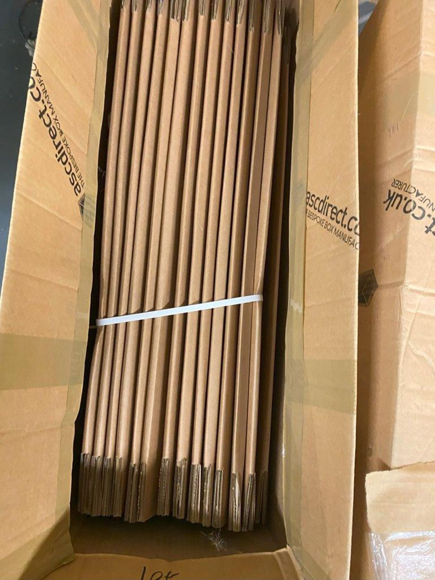 2 Boxes of approximately 40 Total 600mm (L) x 120mm (W) x 120mm (D) Cardboard Boxes and box of 25
