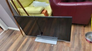 TOSHIBA Flat Screen Television and Remote Control