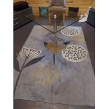 Glass Topped Square Table with Floral Design Rug