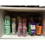 Shelf of Mostly Canned Alcohol inc. Wine in a Can