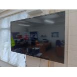 Panasonic 50” Wall Mounted TV with Remote (Buyer to Disconnect & Remove from Wall)