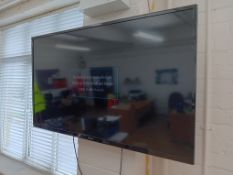 Panasonic 50” Wall Mounted TV with Remote (Buyer to Disconnect & Remove from Wall)