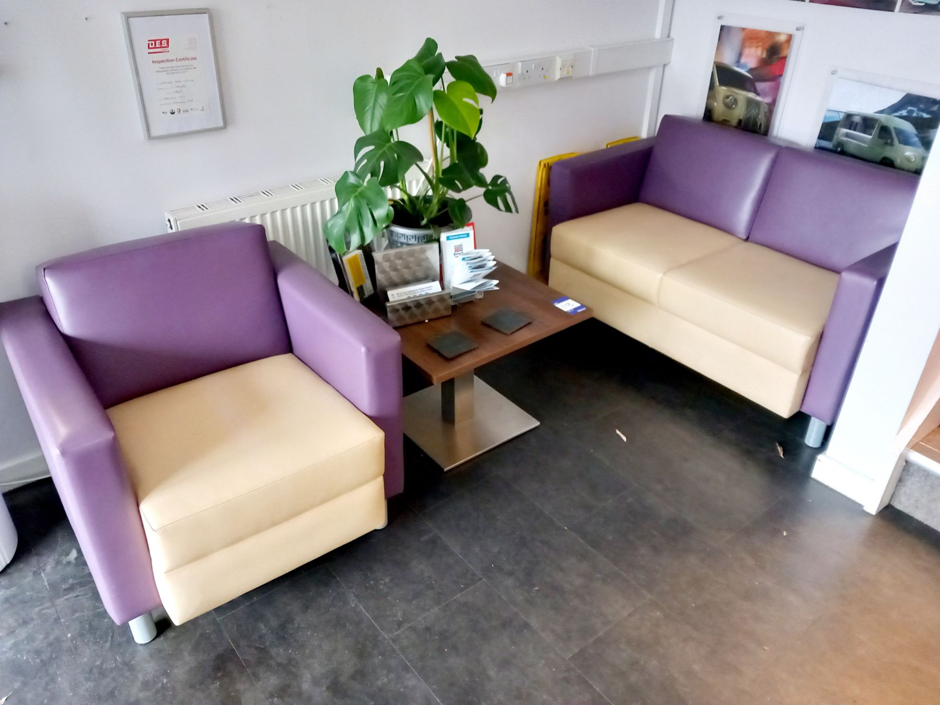 Reception furniture to include cream & purple leather 2 seater sofa and armchair with small coffee