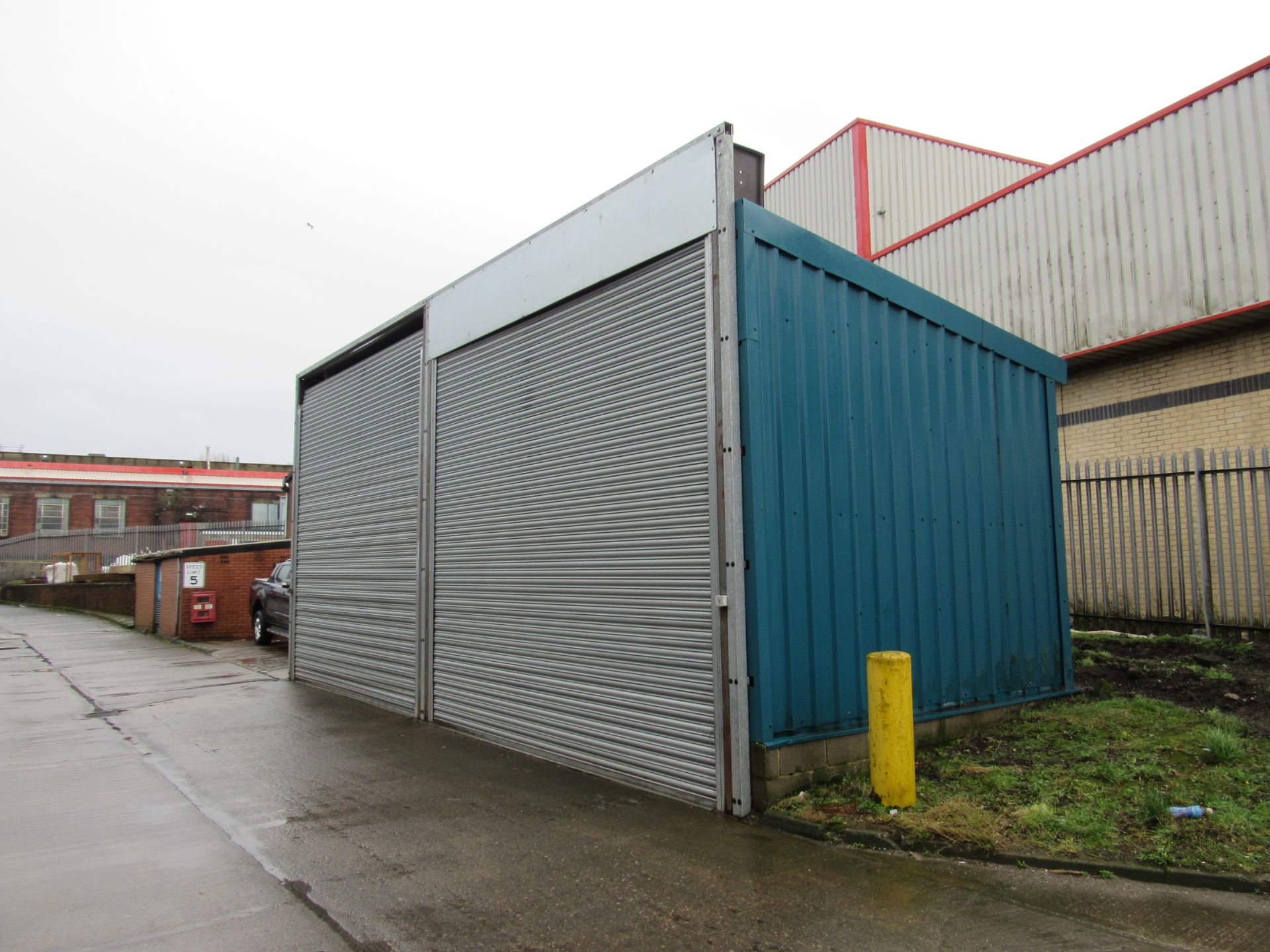 Steel Portal frame store/building with 2 roller shutter doors, electrical control panel, wall and