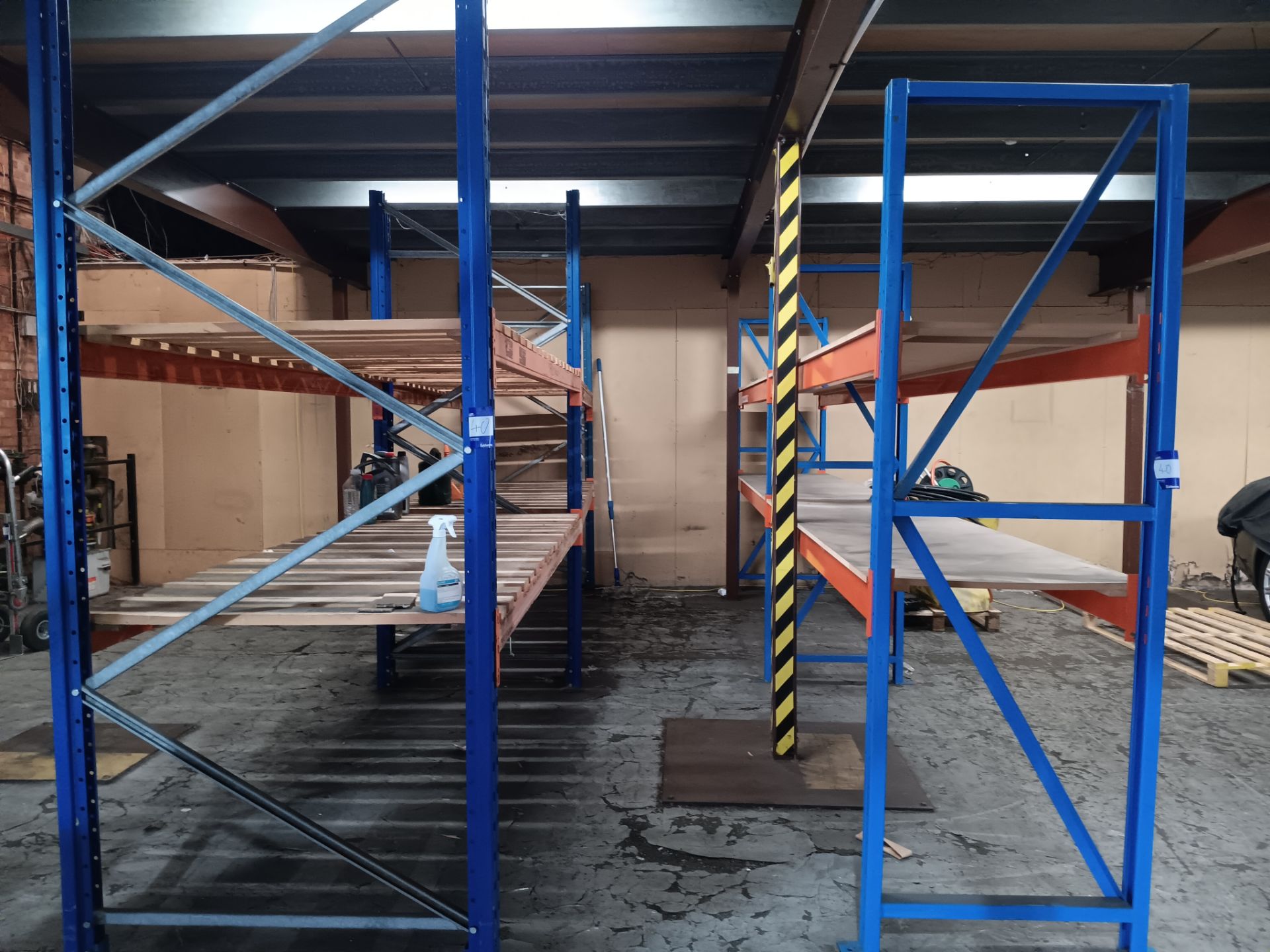 4 bays of orange and blue bolt-less racking height