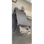 Grey meeting table with 4x meeting chairs. LOCATED