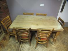Rectangular Pine Farmhouse Table 150 x 85cm with protective glass cover and 6 ladderback chairs.
