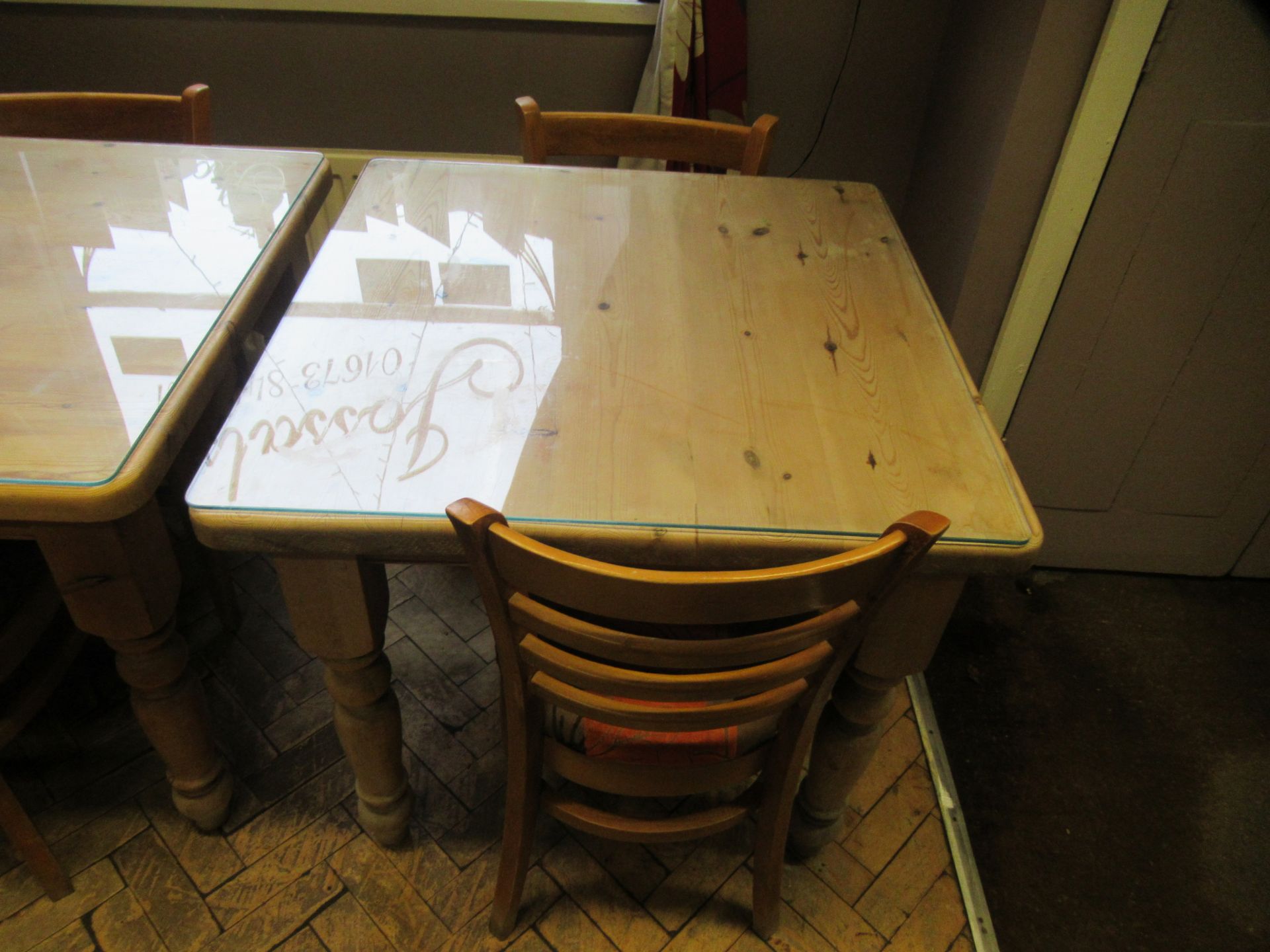 Square Pine Farmhouse Table 85 x 85cm with protective glass cover and 2 ladderback chairs.