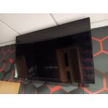 Toshiba 43” 4K Wall Mounted TV – Buyer to disconnect & remove from wall