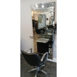 Wall Mounted Salon station, comprising mirror with integrated shelf, footrest, and salon swivel