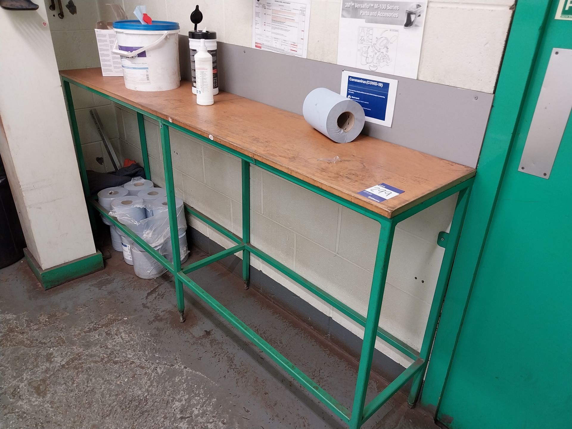 Steel workbench, blue roll and disinfectant wipes