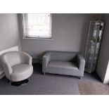 Reception furniture to include grey leather 2 seater sofa, swivel chair, glass cabinet, glass