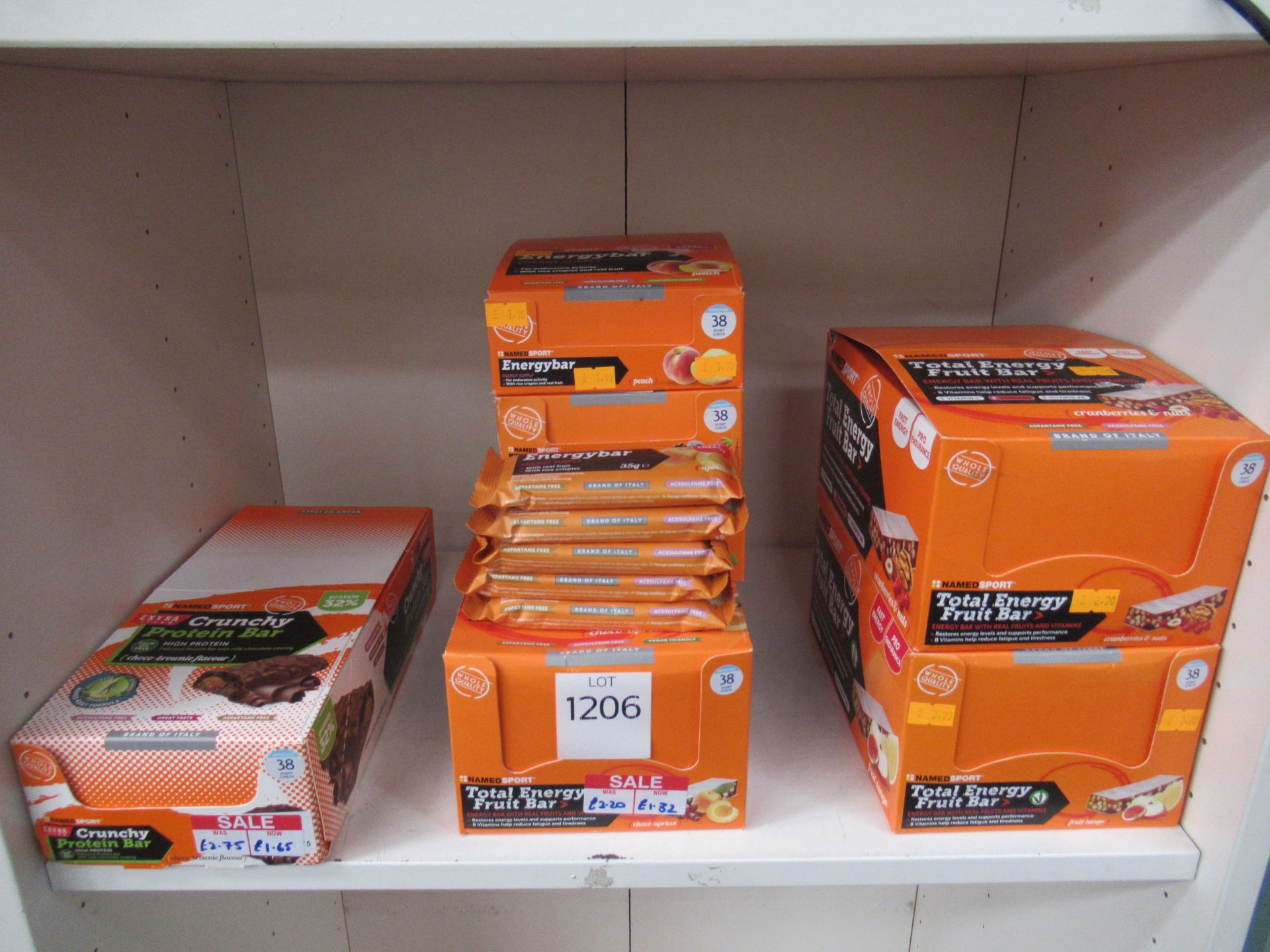 2 x shelves of NamedSport Total Energy supplements featuring energy bars, fruit bars, protein bars,