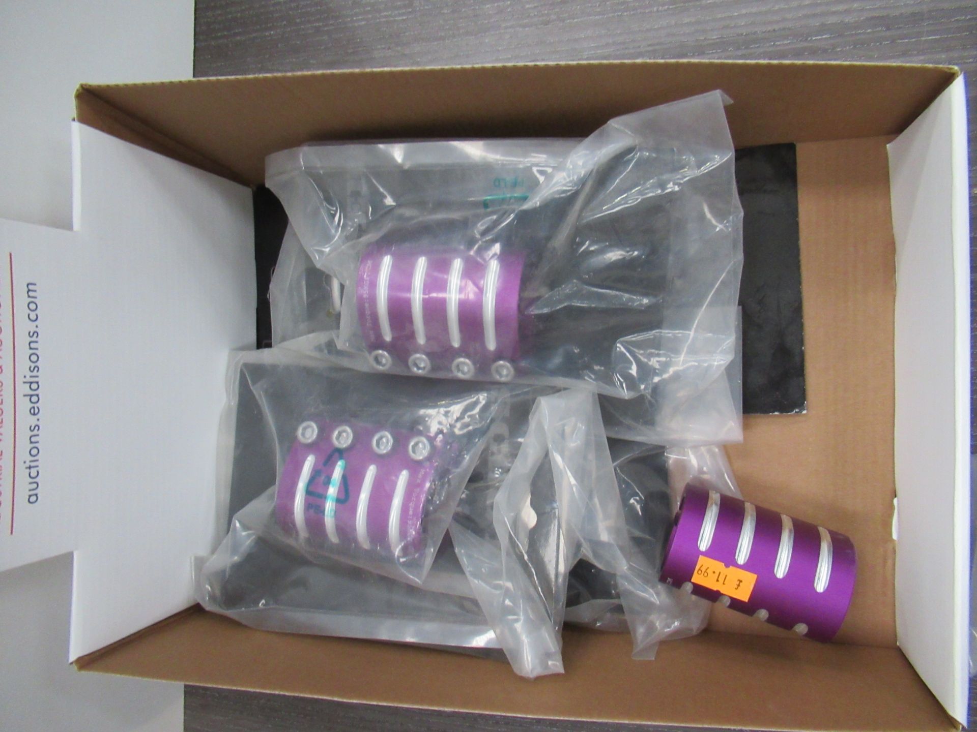 Box of Cuda Scooter's Stunt pegs and CNC clamps - Purple and Black - Bild 2 aus 3