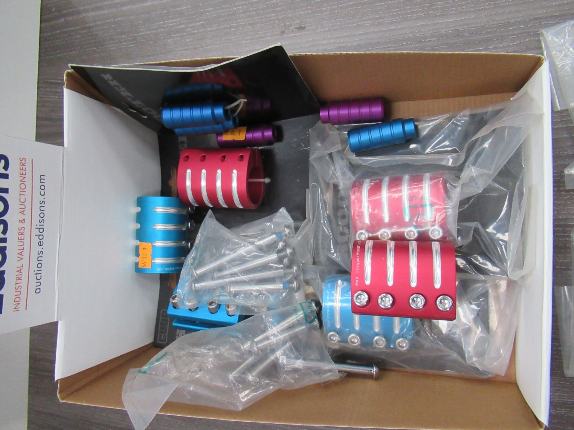 Box of Cuda Scooter's Stunt pegs and CNC clamps - Red, Purple and Blue - Image 2 of 3