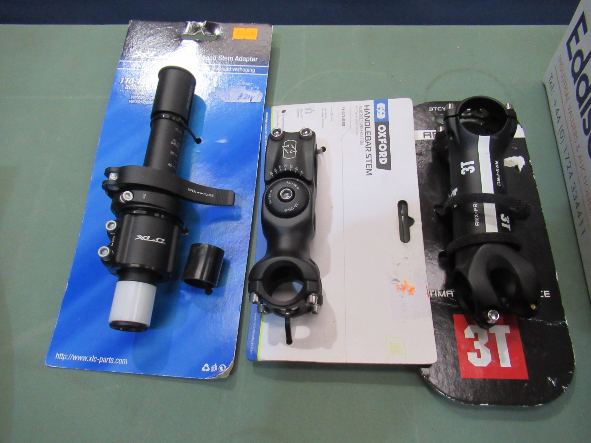 Box of cycling parts to include handlebar stems; stem adapter; bottom bracket sockets; stem raisers - Image 3 of 3
