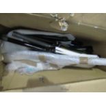 Box containing assorted used bicycle forks