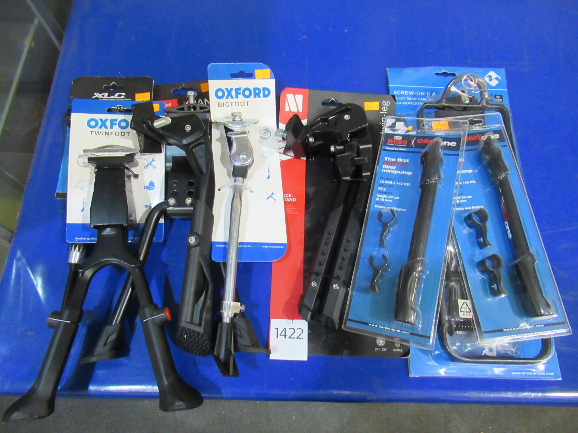 Assorted bicycle stands, a screw on rear carrier and 2 x CarbOne mini-pumps (total approx RRP£175)