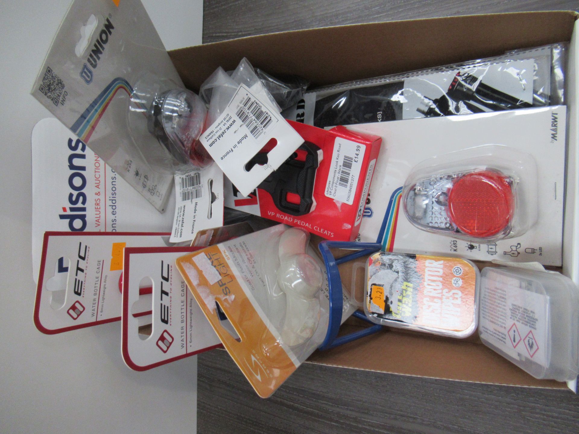 Box of cycling accessories to include cycling lights; bottle cages; road cleatsfork mudguards etc. - Image 3 of 3