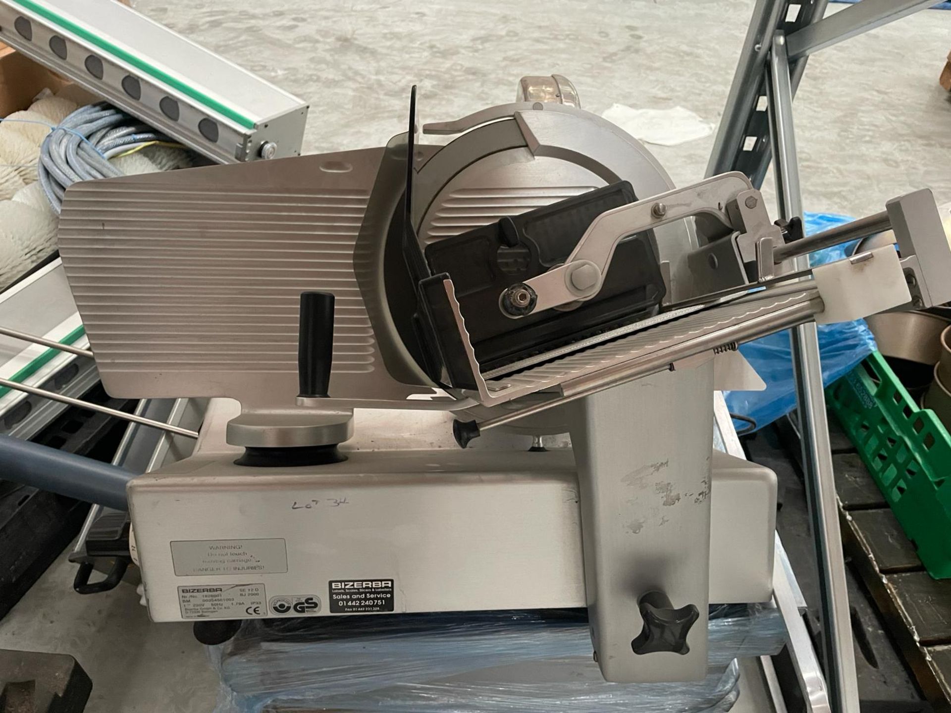 Bizerba SE 12D Meat slicer. Please note this lot is located at Unit 29, Ridge Way, Iver, Bucks,