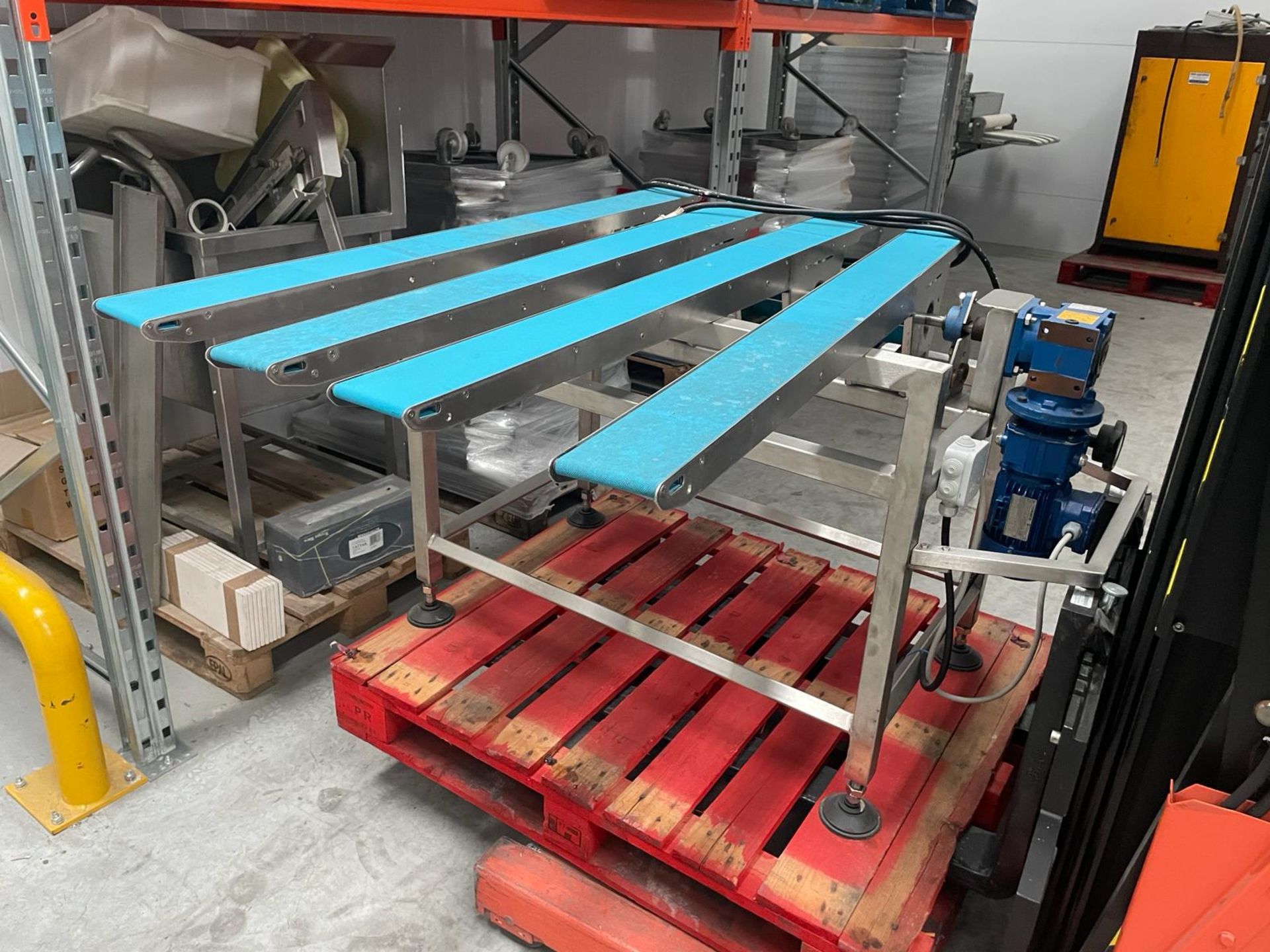 Stainless Steel frame, 4 lane dough transfer conveyor. 70 x 1000 mm arms. 1000 x 1000 mm overall