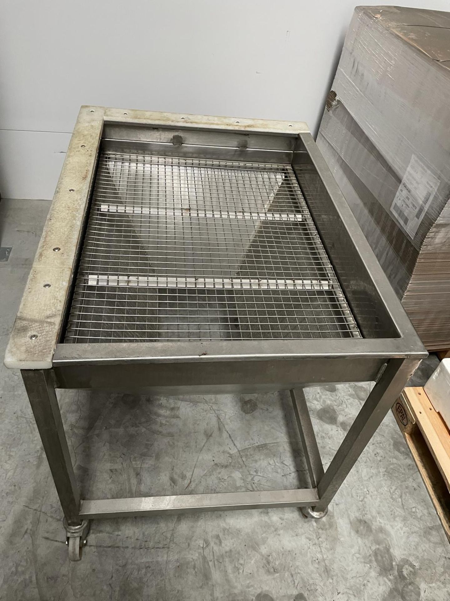 Stainless Steel tapered chute with grid top, potential wash down unit. 1100 x 850 mm. Please note