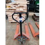 Wide reach pallet truck