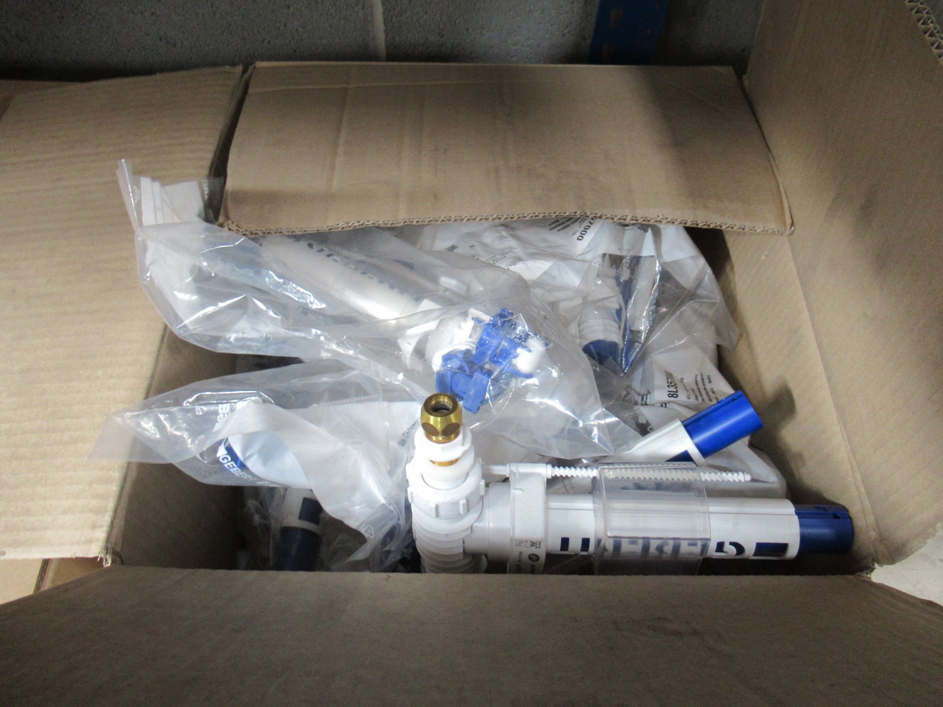 A Box of Geberit Toilet Flush Units