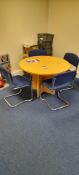 Round meeting table with 4x upholstered cantilever meeting room chairs