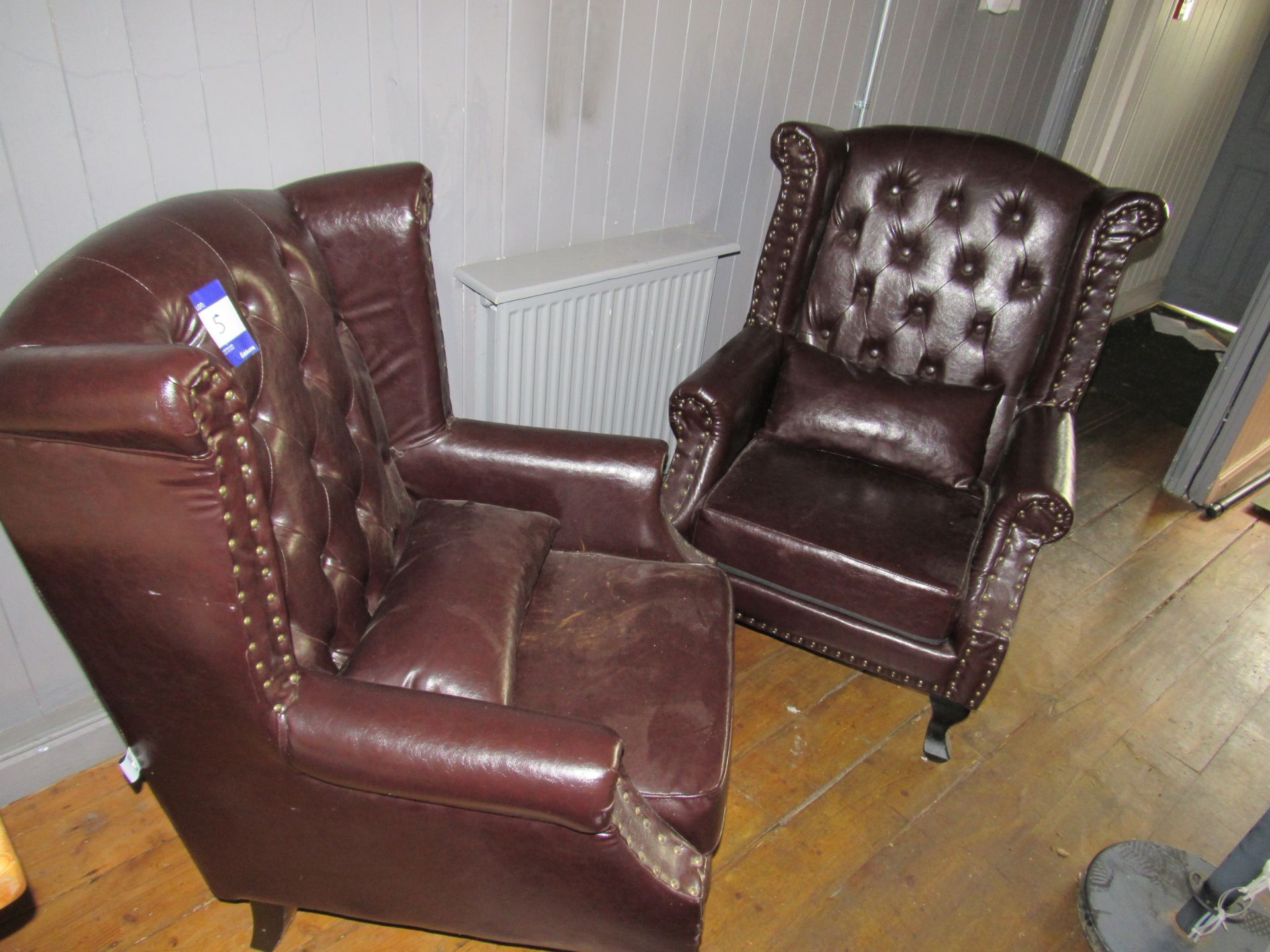 2 Button back leather effect wing chairs