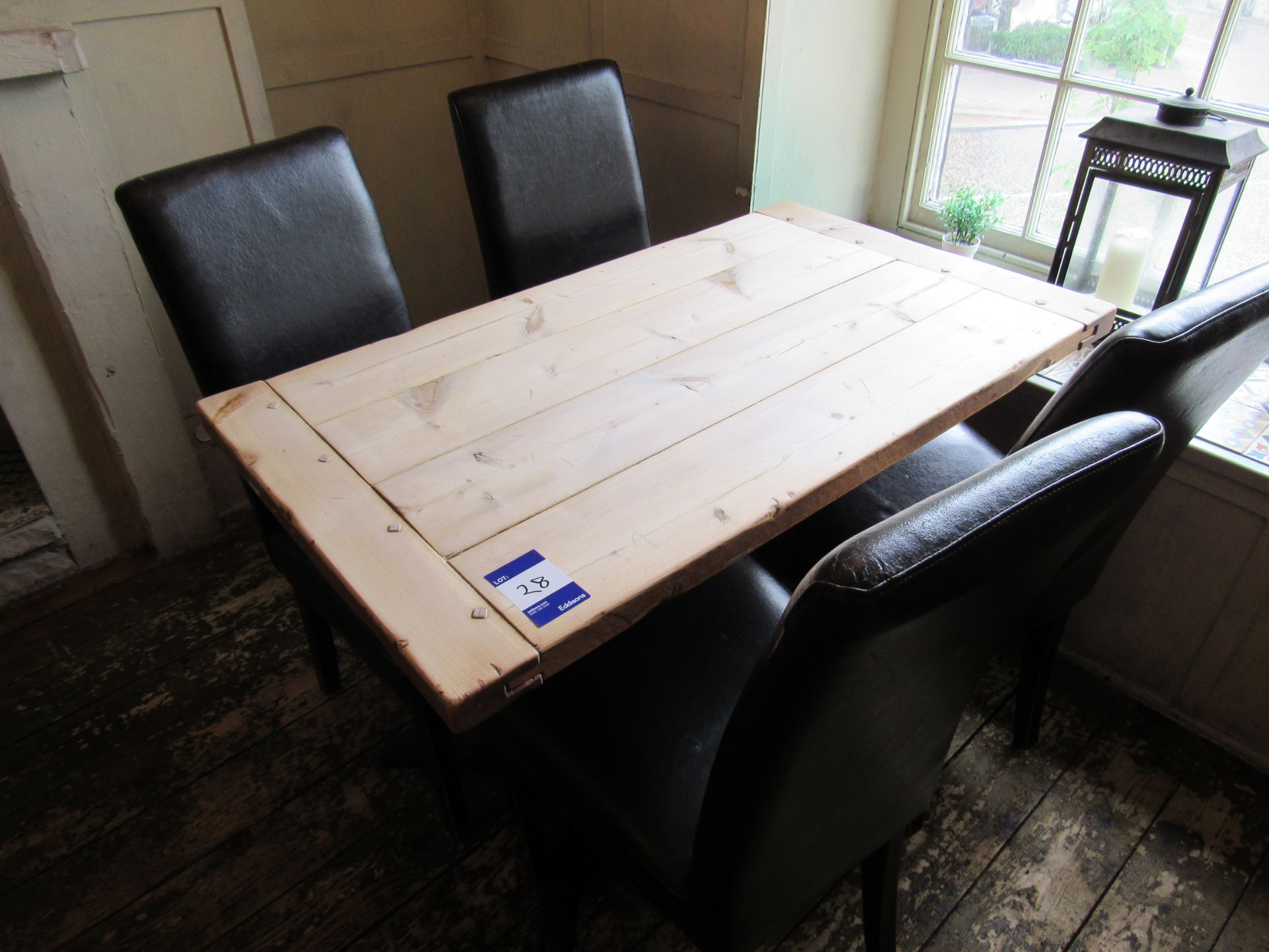 Rustic timber topped table with 4 leather effect dining chairs