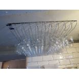 Quantity of glassware and wine rack to bar area